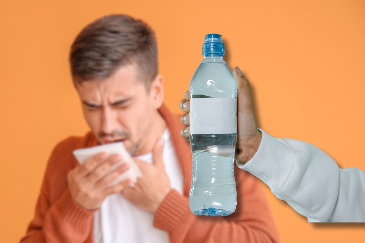 Ragazzo con tosse grassa e bottiglia d'acqua in primo piano